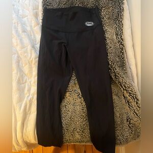 Lululemon Wunder Under leggings with company logo